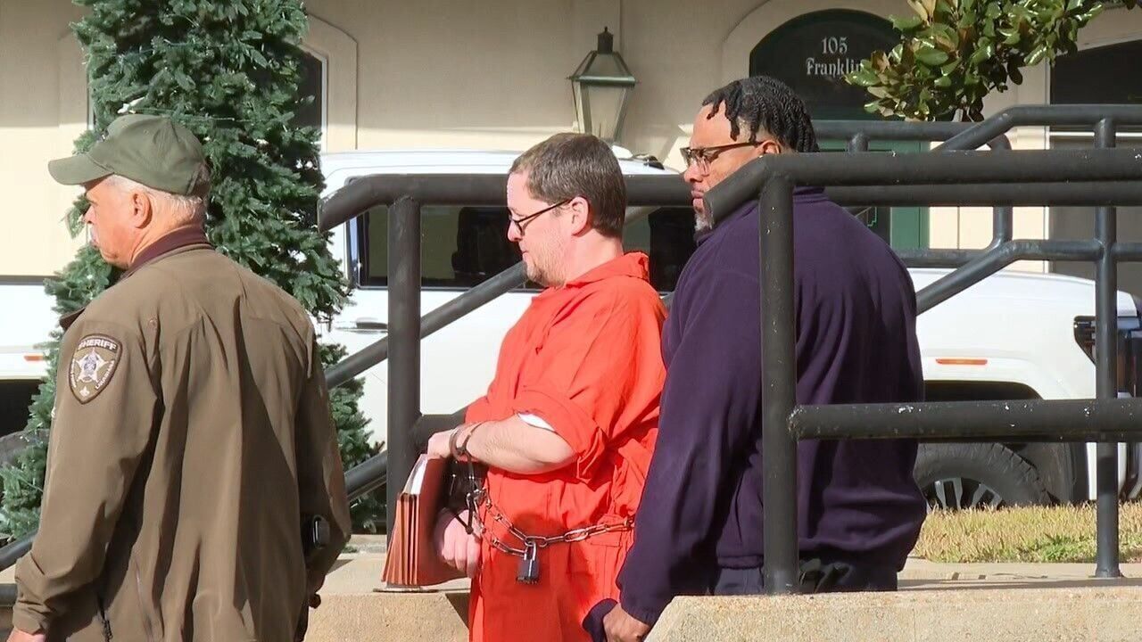 Brian Horn handcuffed and shackled