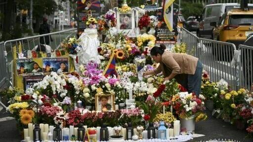 Mourners of Lobga Rangzen erected a makeshift shrine at the scene of his self-immolation outside the United Nations in New York that has become a rallying point for Tibetan activists
