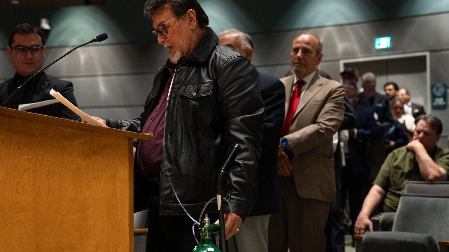 José Luis Mártir, a stone fabrication worker diagnosed with silicosis, testifies at a meeting of the Occupational Safety and Health Standards Board. Photo by Semantha Raquel Norris.