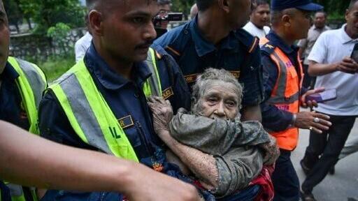 Rescuers in Nepal launched an urgent hunt for survivors of a deadly flood on the border with Tibet