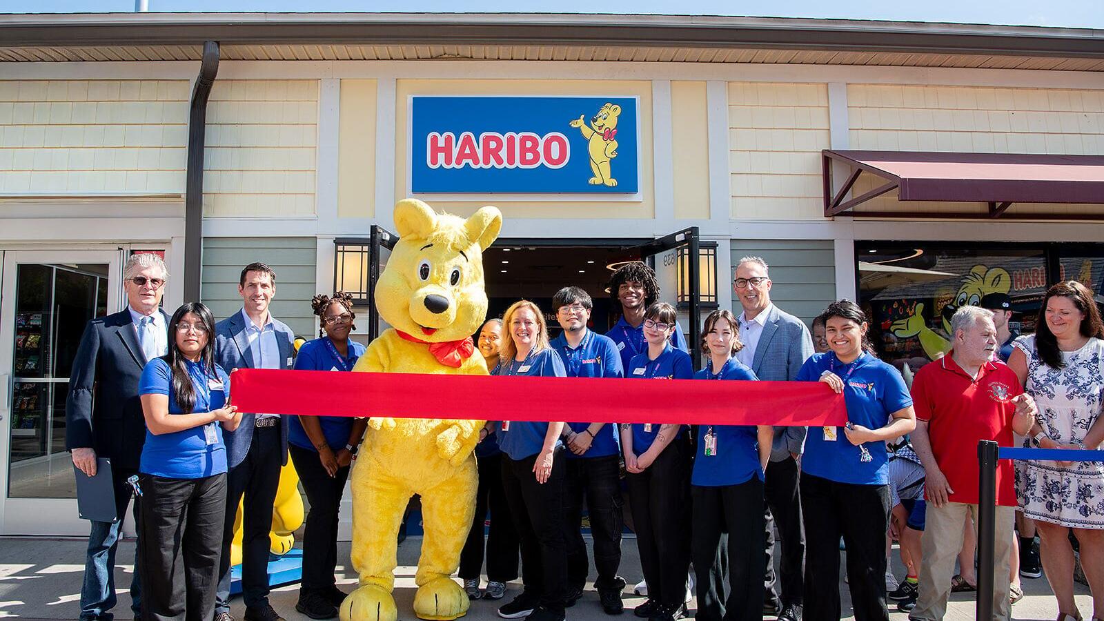 HARIBO celebrates the grand opening of its first-ever U.S. retail store at Woodbury Common Premium Outlets in Central Valley, New York on Friday, August 7. Pictured alongside HARIBO store team members, from left: Christopher Eachus, New York State Repre...