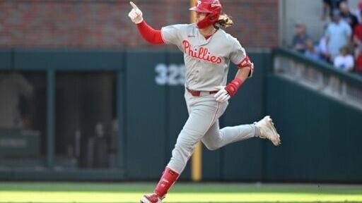 Philadelphia's Alec Bohm runs the bases after smashing a game-winning 10th-inning home run that gave the Phillies a 4-3 win at Atlanta to level their MLB playoff series