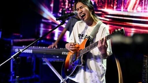 Rising Thai teen rock Nene Royal put in a brief appearance in Bangkok on September 30, days after winning the 2026 edition of "America's Got Talent"