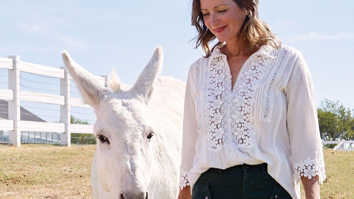 FarmHouse Fresh Founder and CEO Shannon McLinden with Gus the donkey.