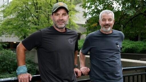 Romanian athlete Tiberiu Useriu (L) and his brother Alin Useriu (R) now lead an NGO dedicated to environmental and social projects