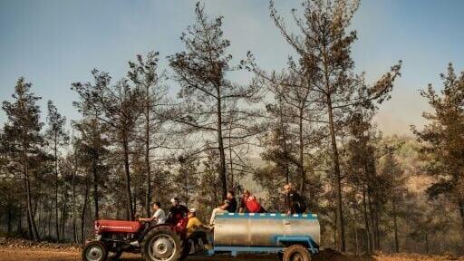 The national forestry office said firefighters had intensified the battle started Wednesday outside Fethiye