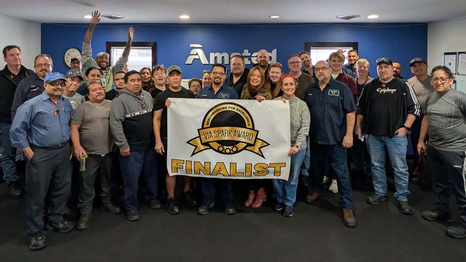 Amsted Automotive employees from the company's Geneva, Illinois, manufacturing facilities celebrate earning three 2026 Valley Industrial Association (VIA) Spark Awards, including the Overall VIA Spark Award, along with awards for Operational Excellence ...