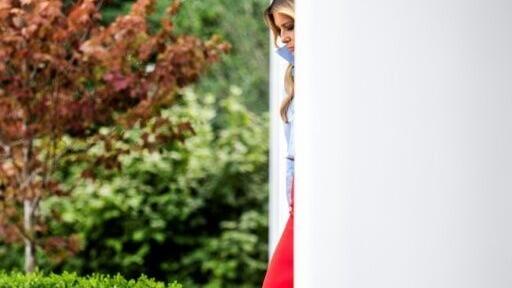 US First Lady Melania Trump arrives to host an event in the Rose Garden of the White House, in Washington, DC, on August 20, 2026, her first public appearance in a month