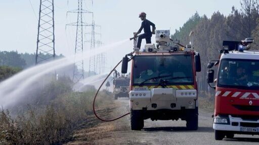 Firefighters, volunteers battle to prevent fires from flaring up again