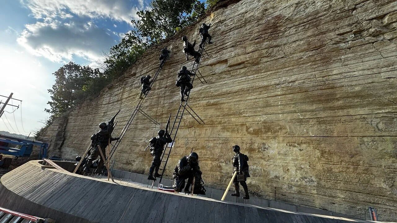 The recent installation of life-size bronze statues - honoring members of the U.S. Army Provisional Ranger Group Second Battalion in their efforts scaling Pointe du Hoc in Normandy, France, on D-Day, June 6, 1944 - at the National Memorial of Military A...