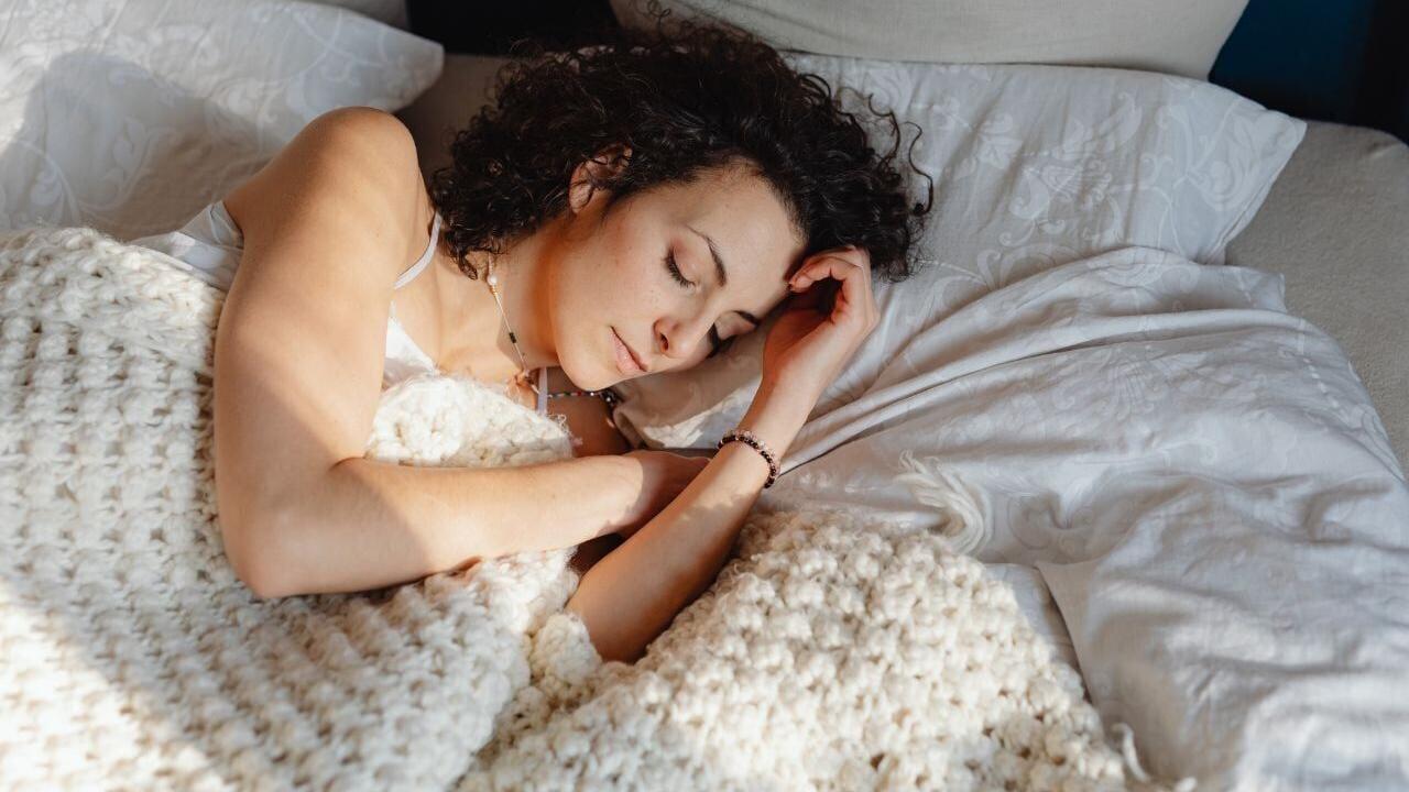 woman sleeps in luxury hotel