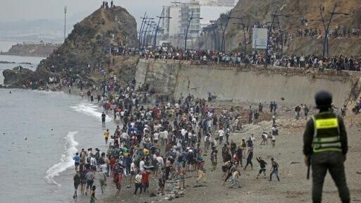 Police said at least 18 people lost their lives in the treacherous dash into the Spanish territory of Ceuta