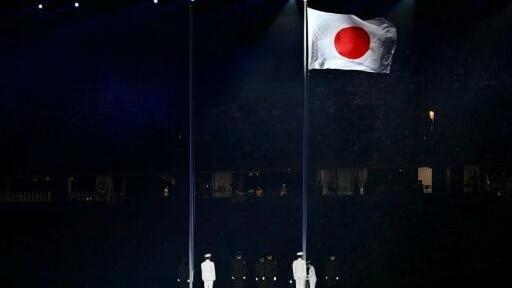 Japan's national flag is being hoisted during the opening ceremony of the 2026 Asian Games