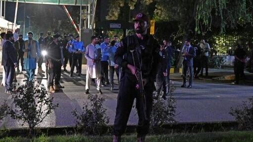 Security personnel patrolled near Shifa International Hospital as the court warned Imran Khan's supporters not to gather on hospital grounds