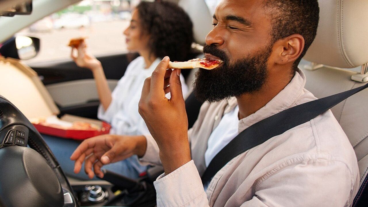87% of people in the US eat in their cars. Here are the 10 states where mealtimes happen behind the wheel the most
