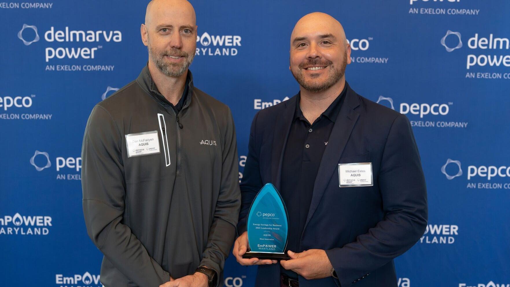 Dan McFadyen (L) and Michael Estes (R) of AQUIS receive the Pepco "Most Innovative Project" Service Provider Award