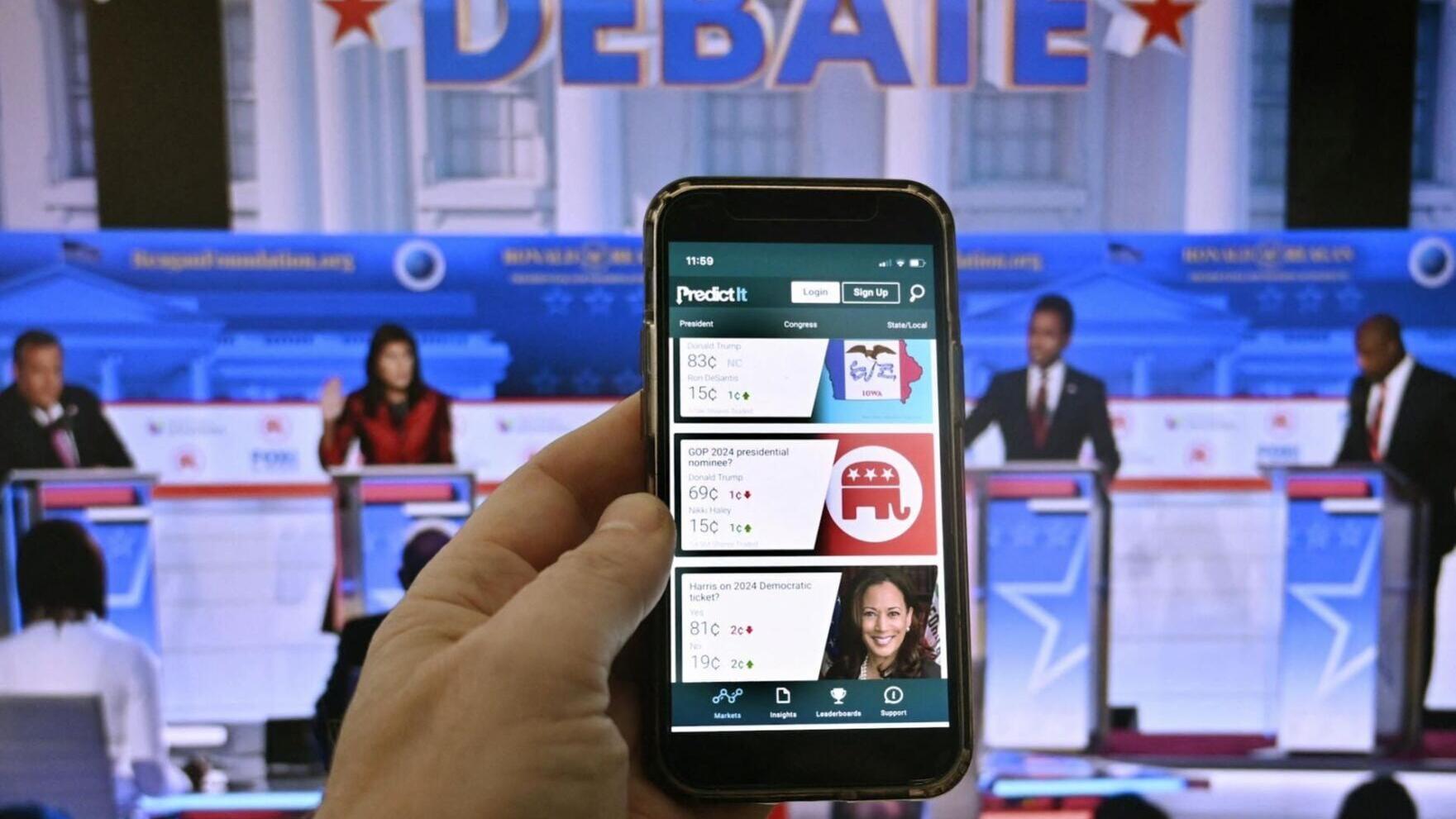 Prediction markets are playing a growing role in political forecasting.
              Olivier Douliery/AFP via Getty Images via The Conversation