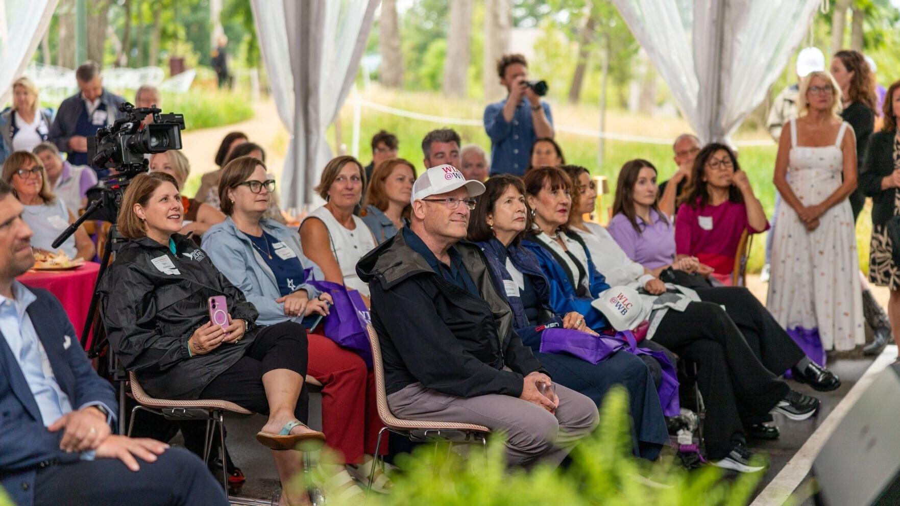 Supporters, community leaders, public officials, friends and project partners attended the ribbon cutting celebration of the Women's Leadership Center at Williams Bay on July 31, 2026.