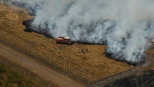 French firefighters remain wary of flare-ups