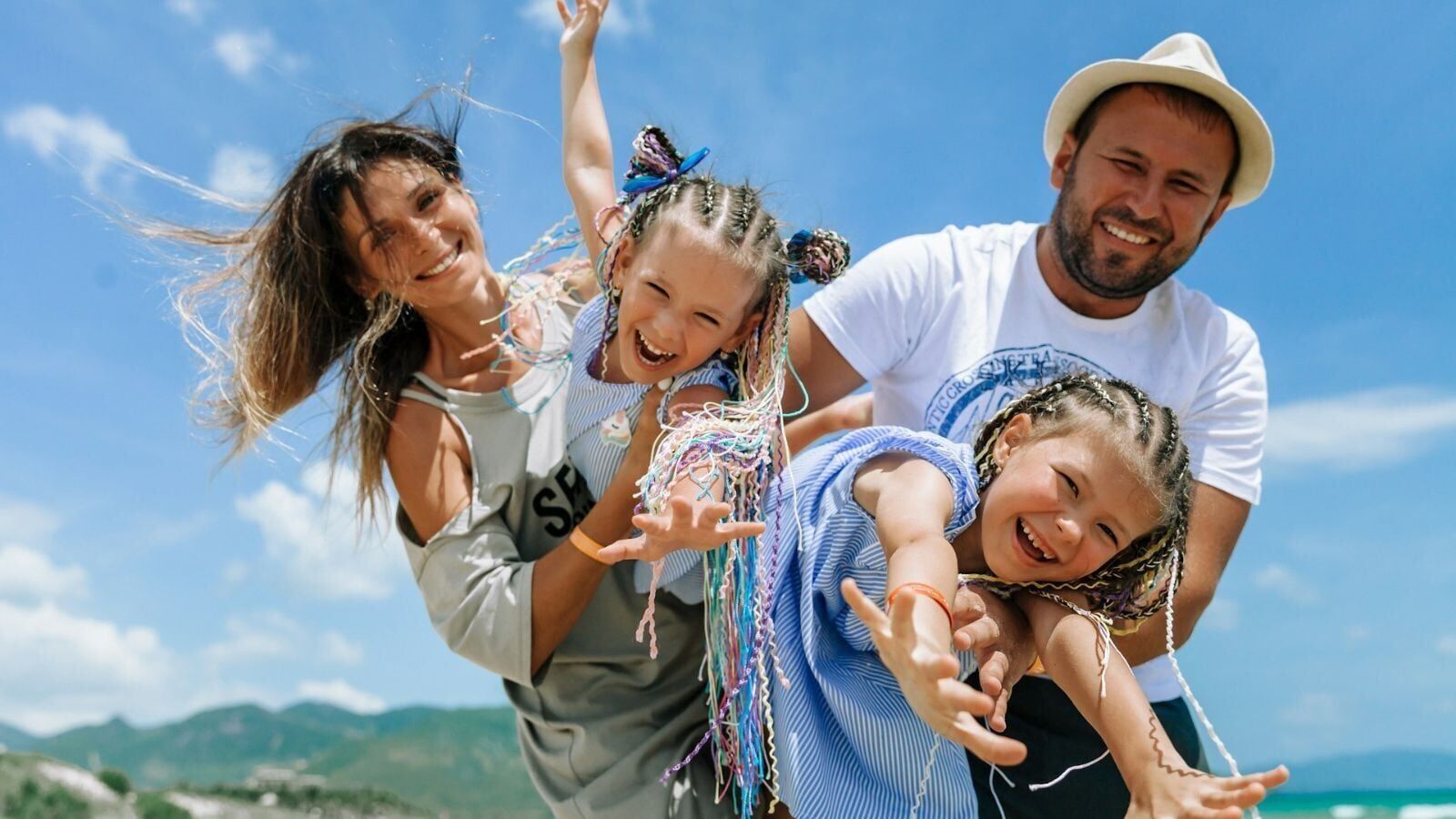 Happy family on vacation Unsplash