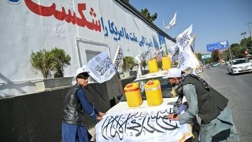 Some people attached dummy yellow canisters to their cars, symbolising those that had held homemade explosives during the Taliban's two-decade insurgency