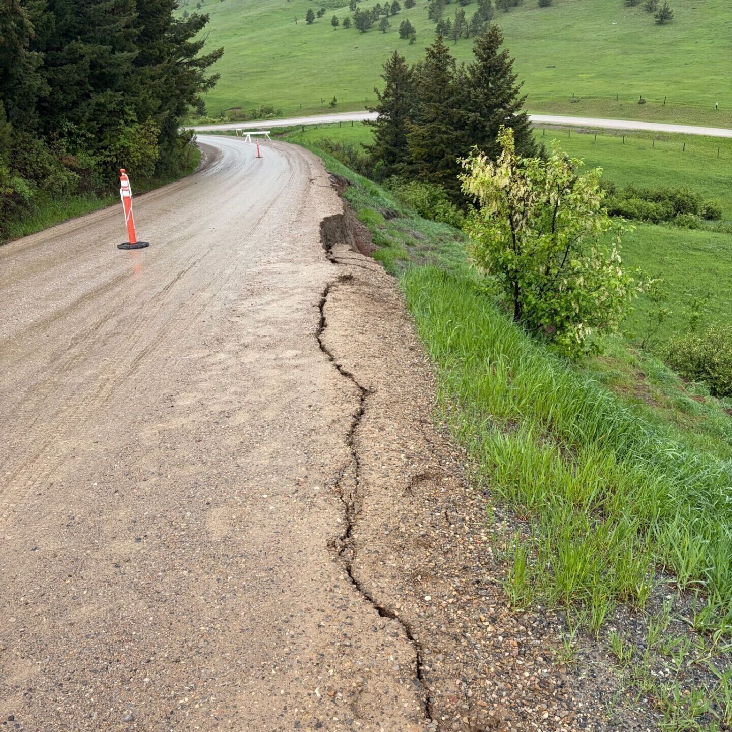 Evans Riceville Road near Belt down to one lane after slide4