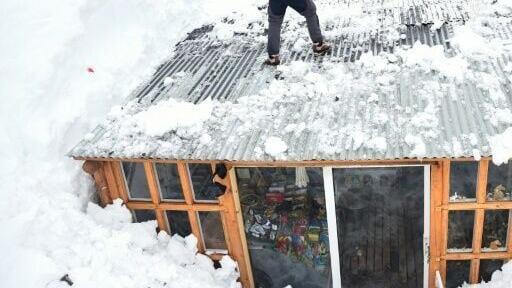 Authorities closed a key border crossing from Argentina into Chile over the extreme snowfall