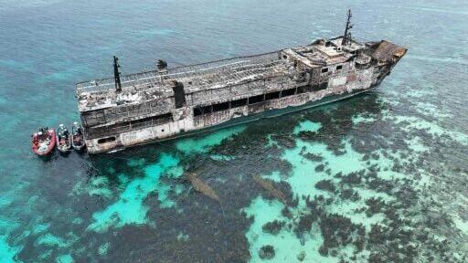 Authorities have not said exactly how many bodies remain aboard the M/V June Aster, which sits grounded off the coast