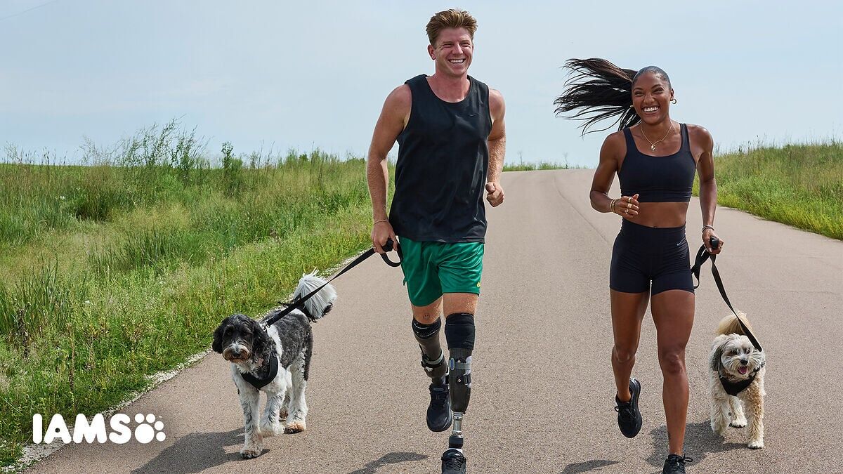 Gold medalists Tara Davis-Woodhall and Hunter Woodhall join forces with IAMS™ and Strava to launch the first-ever IAMS Dog Run Marathon, a month-long virtual challenge designed to celebrate and safely track our most loyal canine training partners.