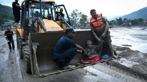 Dozens of people have been killed and hundreds are missing on both sides of the Nepal-Tibet border