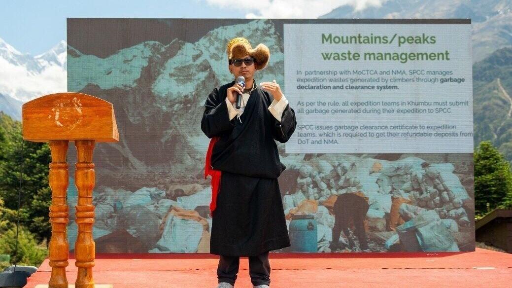 Tshering Sherpa, CEO of the Sagarmatha Pollution Control Committee (SPCC), speaks at the “Himalayan Climate Charter 2026 Namche Summit.”