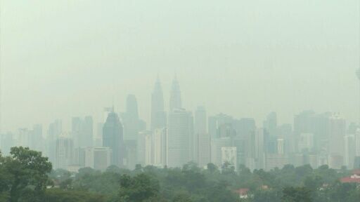 Blanket of haze from Indonesia fires covers capital of neighbouring Malaysia
