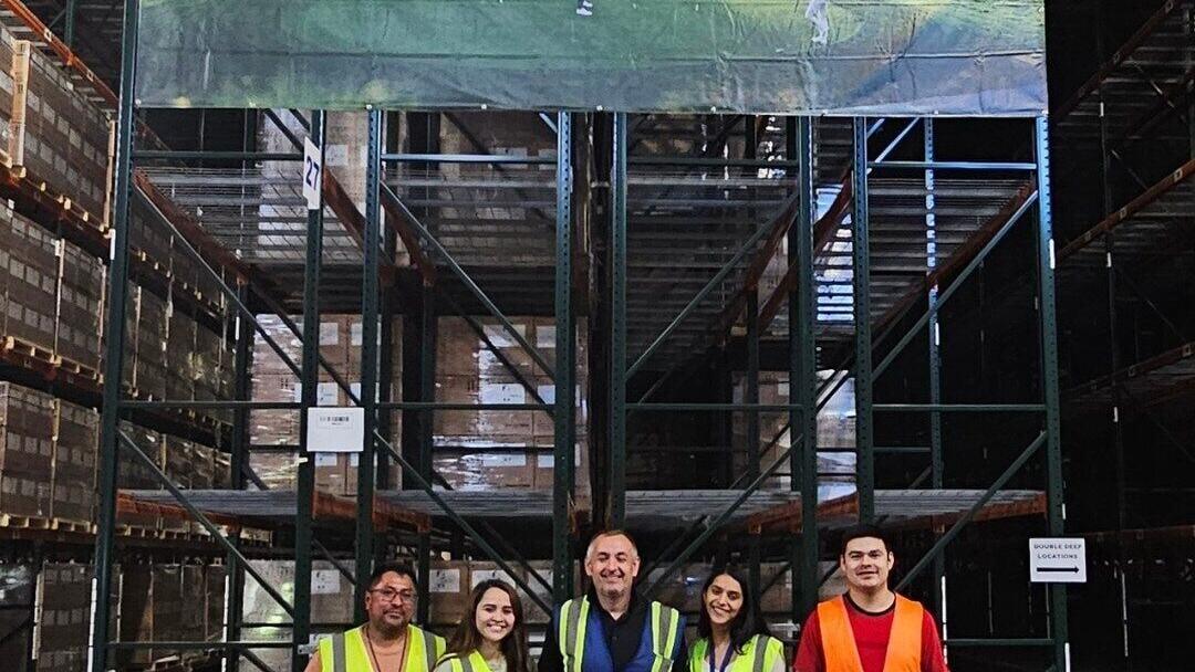 Barrett’s team celebrates the successful go-live of Holderness &amp; Bourne in Hillsborough, New Jersey.