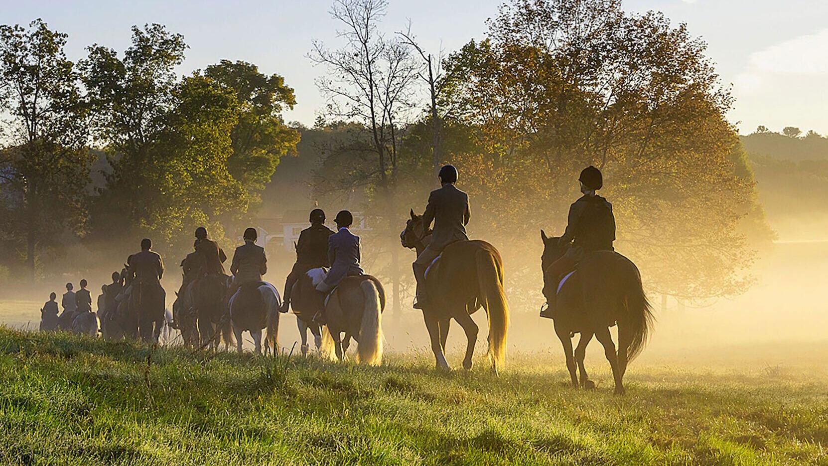 This image, taken by the property owner, shows a pack of riders ready to begin a traditional fox hunt as the sun rises over Hallmark Farm. The property owner is a veteran equestrian who has hosted many classic fox hunts on the property, which still incl...
