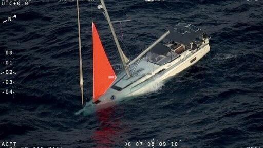 Four sailors were rescued after a sperm whale struck their yacht in the South Pacific