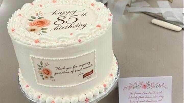 Sara Lee Frozen Bakery Product Developers David Meza, Senior Food Scientist; Adam Hegadorn, Senior Food Scientist; and Becky Sowa, Manager, Technical Services, designed Sara Lee's 85th Birthday cake. The team surprised Sara Lee with a layered creation o...