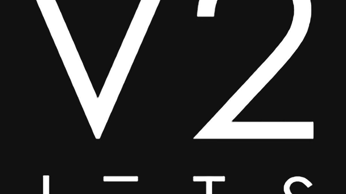 Logo Vertical (PRNewsfoto/V2 Jets)