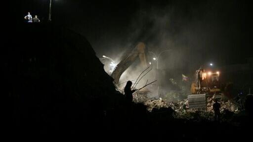 Rescuers in Venezuela even work through the night to look for quake victims
