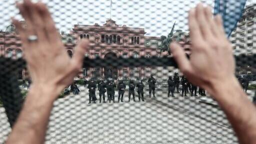 The IMF managing director's visit was met with protesters outside the Casa Rosada presidential palace