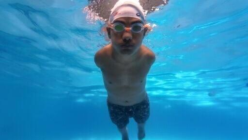 Harka Man Gharti swimming during a training session in Kathmandu