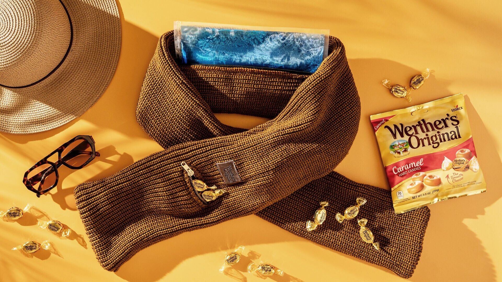 Werther’s Original Cozy Cooling Scarf. Sunglasses and hat are not included.