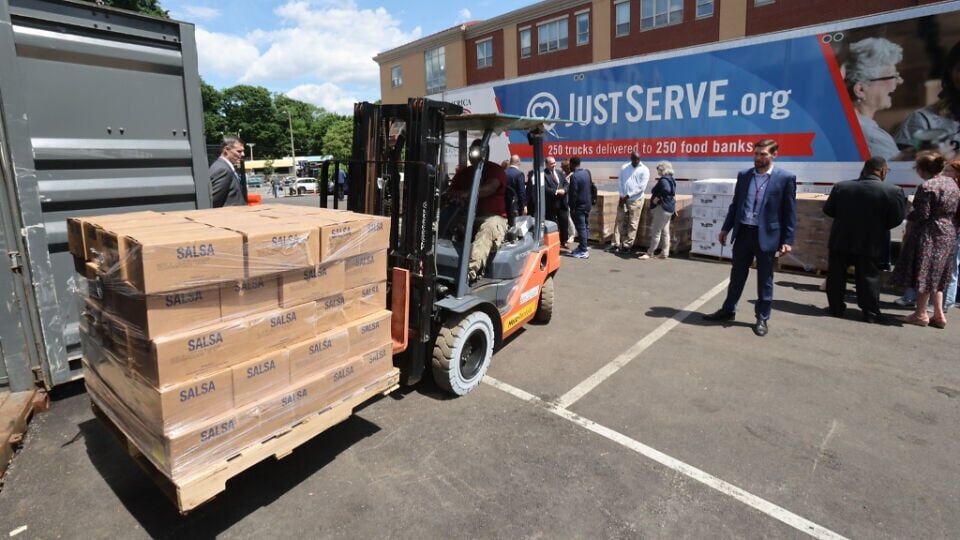 A semitruck carrying more than 37,000 pounds of food from The Church of Jesus Christ of Latter-day Saints is delivered to Catholic Charities Boston Yawkey Center in Boston, Massachusetts, on Wednesday, June 17, 2026, as part of America250's nationwide "...