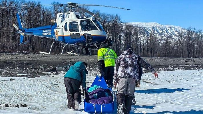 Freezing temperatures and exposure to wind create serious hypothermia risks. Wearing well-insulated winter gear from RefrigiWear protected Christy Rutter as she awaited rescue on the frozen Susitna River.