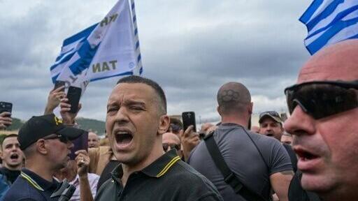 Former spokesman of Greek ultra-nationalist party Golden Dawn, Ilias Kasidiaris (C-L), was released following a 13-year sentence