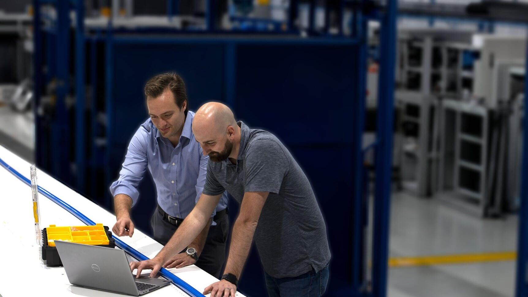 ThayerMahan Array Manufacturing Team Inspects a Linear Hydrophone Array