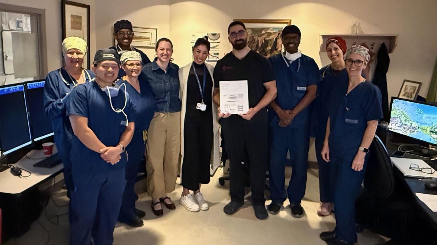 Dr. Robert Fahed (center) with members of the clinical care team at The Ottawa Hospital following the study's first patient enrollment.