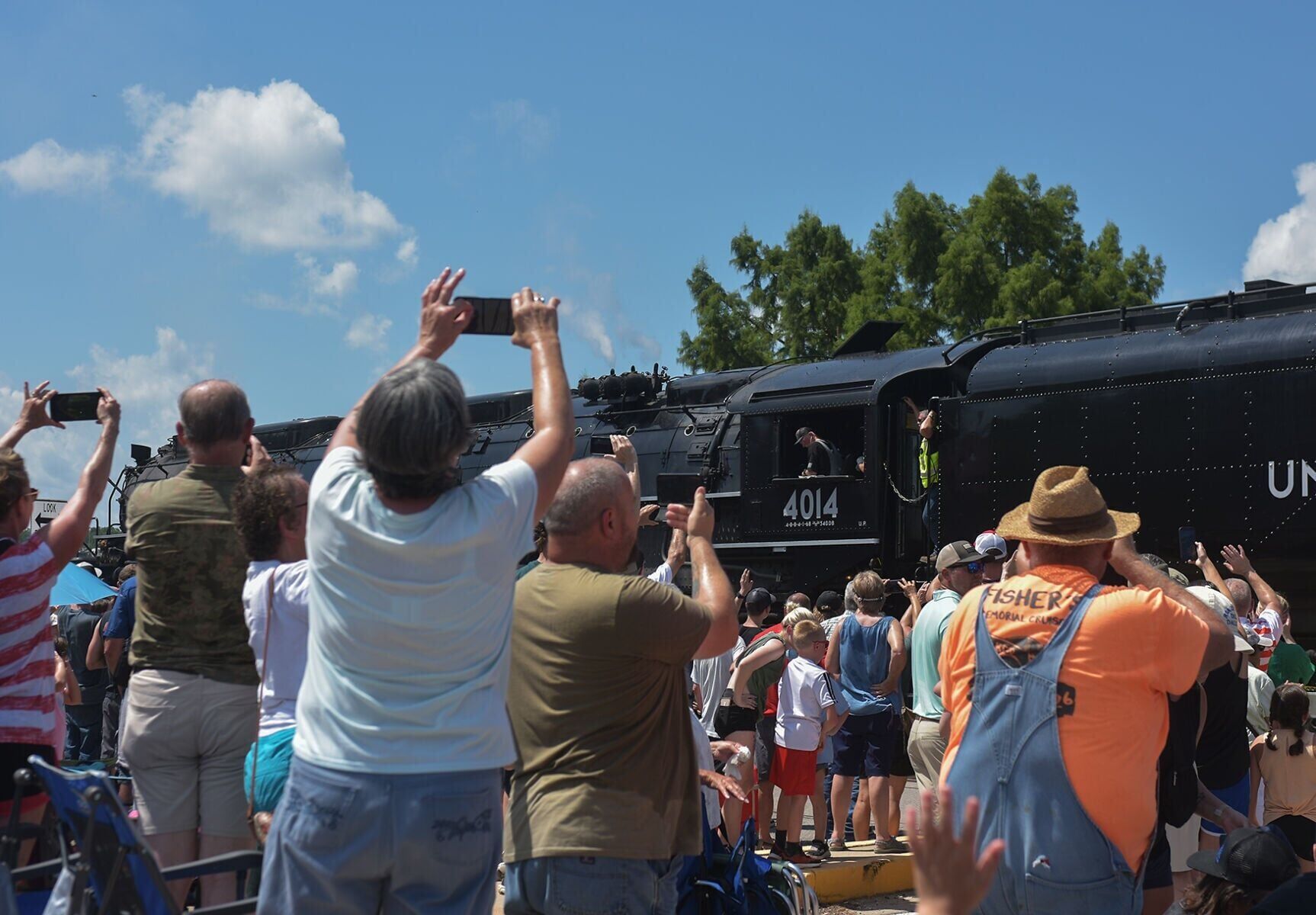 The Big Boy Steam Locomotive crew waves