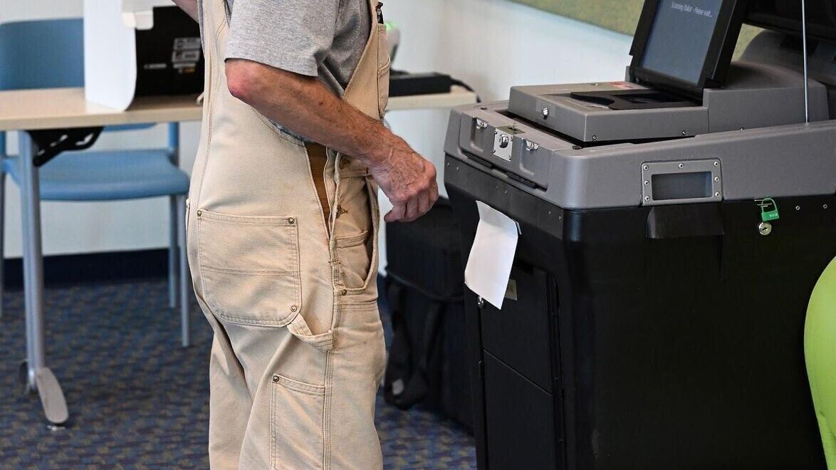 Louis Wilson waits for his ballot submission