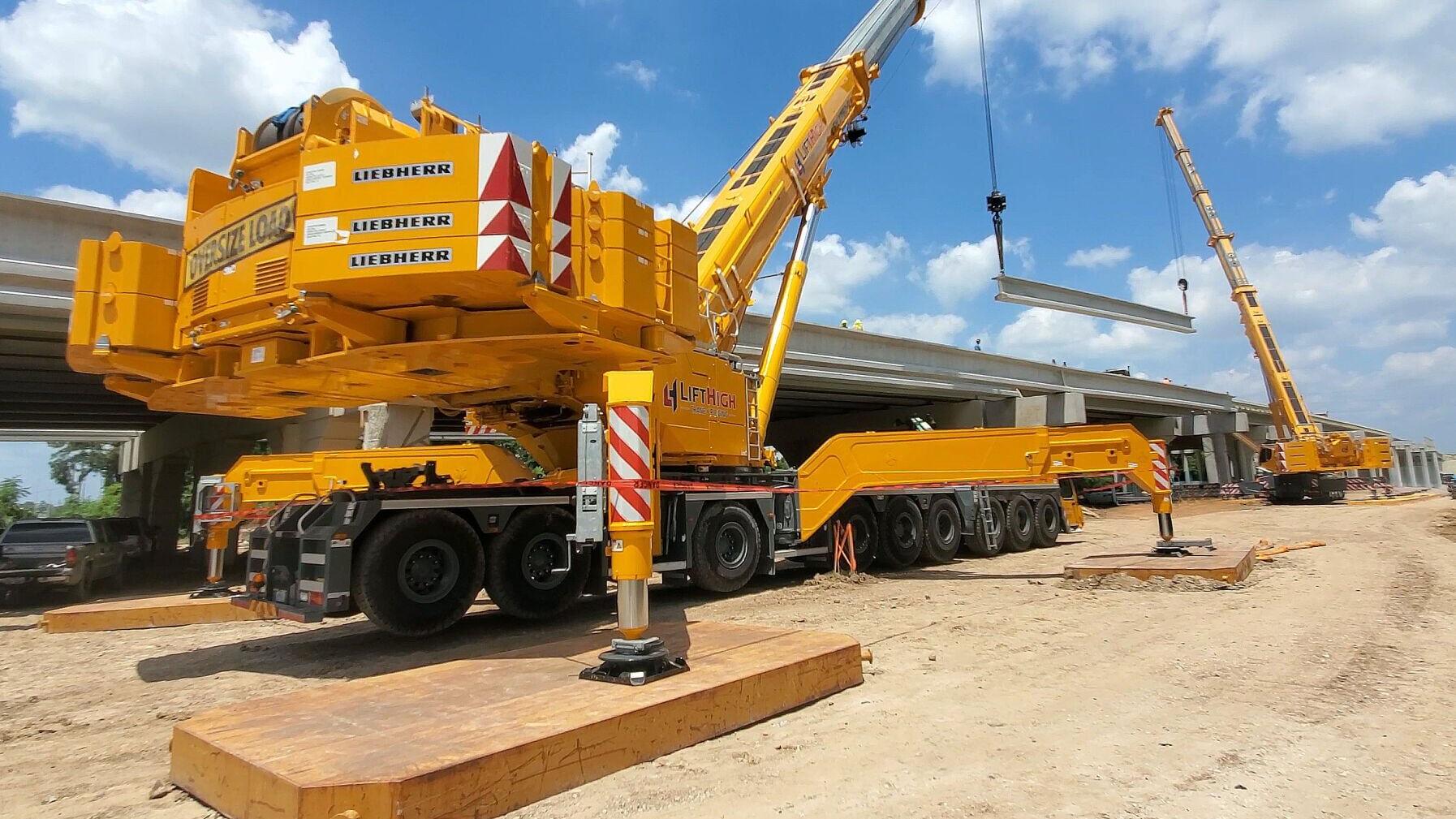 LiftHigh Crane &amp; Rigging performs a tandem lift using a 900-ton and 400-ton Liebherr crane to place bridge beams on a Texas infrastructure project.
