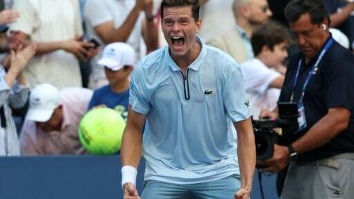 Belgium's Alexander Blockx celebrates his upset win over fifth-seeded Flavio Cobolli in the US Open third round